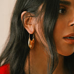 Monikh Dale x Daphine Vol. II. Monikh wears the Rochelle Gold Plated Hoop Earrings.